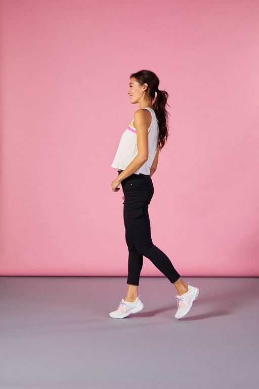 woman in athleisure outfit with sneakers