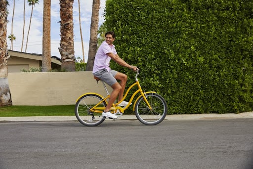 Young man ridin a bicycle